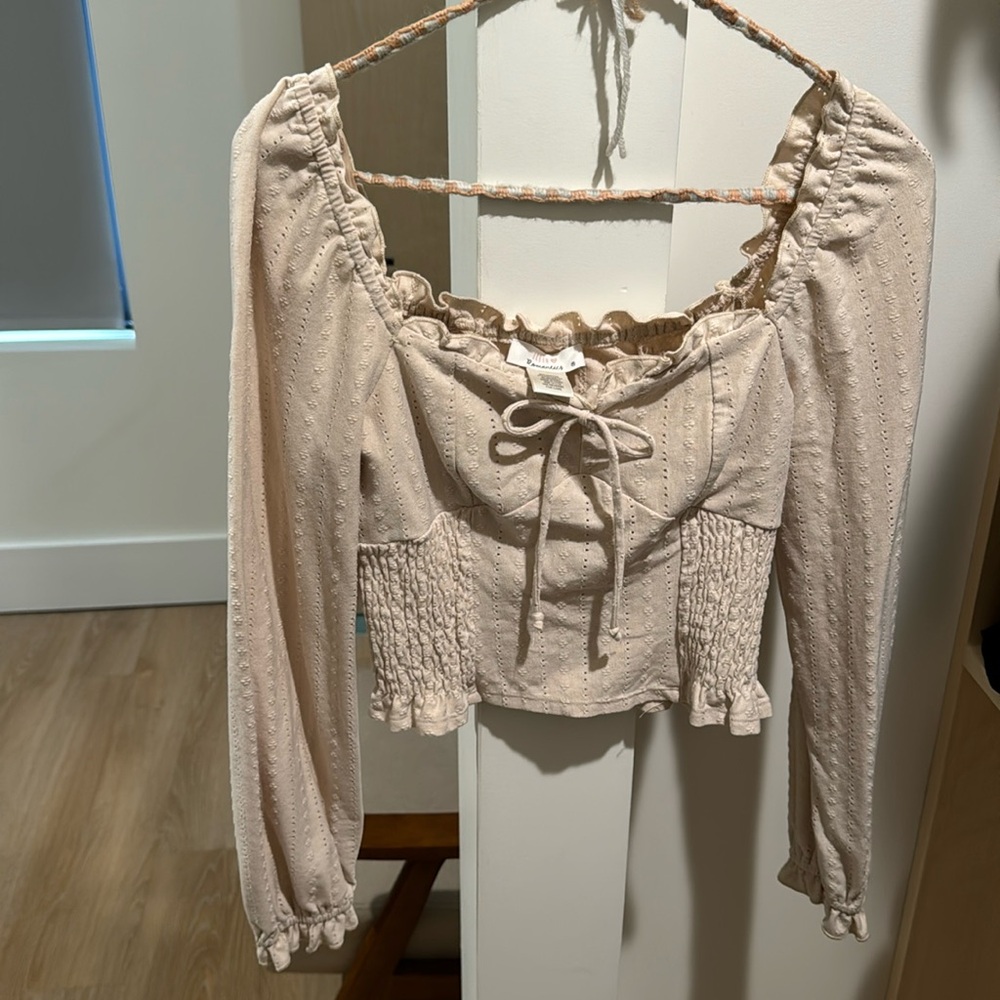 Cropped cream blouse